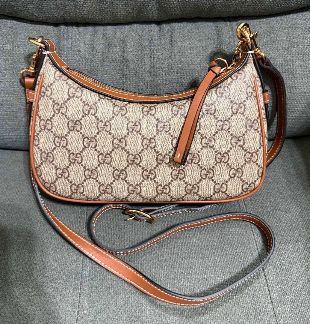 GG Small Emblem (Category: Shoulder Bags) located in Quezon City. Submitted by luxxechic (Listing ID 1468319552, Image 2). Description: coded with black etiketa GG underzip with dust bag with hang tag good as new no issue actual photo posted japan preloved mop: gcash.