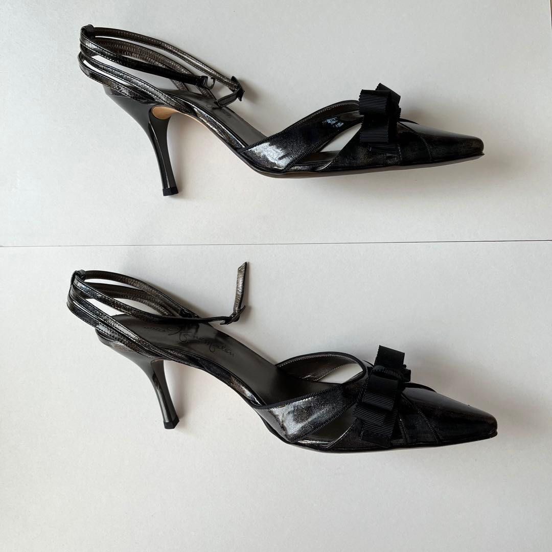 Ginza Kanematsu Black Bow Slingback Heels (Category: Heels) located in Quezon City. Submitted by ianabanana20 (Listing ID 1468359694, Image 2). Description: So chic!! never used, stored only. Perfect for office wear and even casual dates!! authentic!! bought for 10kish Comes with its orig box 10/10 condition - Brand: Ginza Kanematsu - Style: Slingback heels with slim stiletto heels - Color/Finish: Dark metallic - Details: Pointed toe with layered
