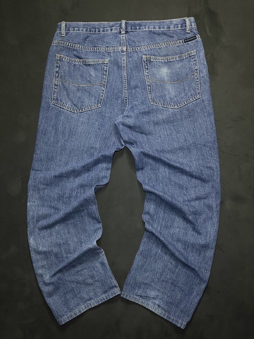 Giordano Blue Slim Taper Jeans Size 33 (Category: Jeans) located in Muntinlupa City. Submitted by pastforwardthrift (Listing ID 1468498974, Image 2). Description: - Brand: Giordano - Style: Slim taper jeans with slight distressing on thighs - Color: Classic blue wash - Size: 33 - Material: 99% cotton, 1% other fibres - Details: Branded button closure, zip fly, standard 5-pocket design, contrasting yellow stitching - Origin: Made in China.