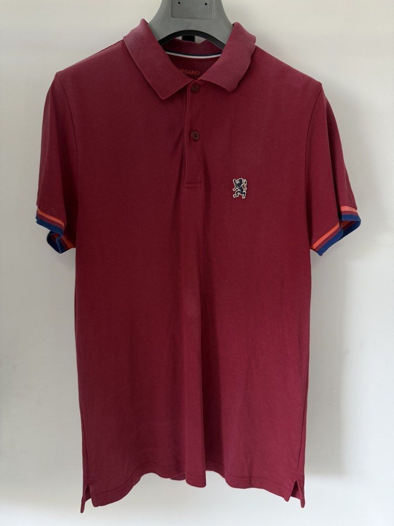 Giordano Maroon Polo Shirt Size M (Category: Tshirts & Polo Shirts ) located in Quezon City. Submitted by satisfied_buyer (Listing ID 1468293941, Image 1). Description: - Brand: Giordano - Color: Maroon - Size: M (Standard sizing 170/96A, Classic Fit) - Material: 100% Cotton for all-day comfort - Design: Short sleeves, button placket, collar, and contrast ribbed detailing on cuffs - Details: Small embroidered logo on the chest - Origin: Made in C