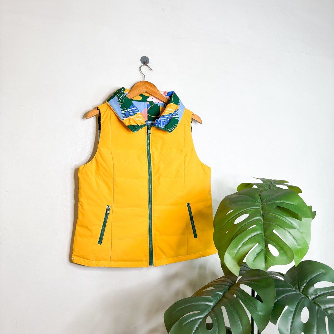 Gitti | Reversible Vest. (Category: Vests) located in Manila. Submitted by bypiecesandstories (Listing ID 1468323419, Image 2). Description: Gitti | Reversible Vest. 649 PHP 🧡 Perfect Condition Can Fit — X Small to Medium Dimensions — W 21" L 24.5" Two looks in one! This reversible vest features a bright yellow side and a colorful printed side, giving you two different styles in a single piece. Get two looks for the price of one, steal deal. • R