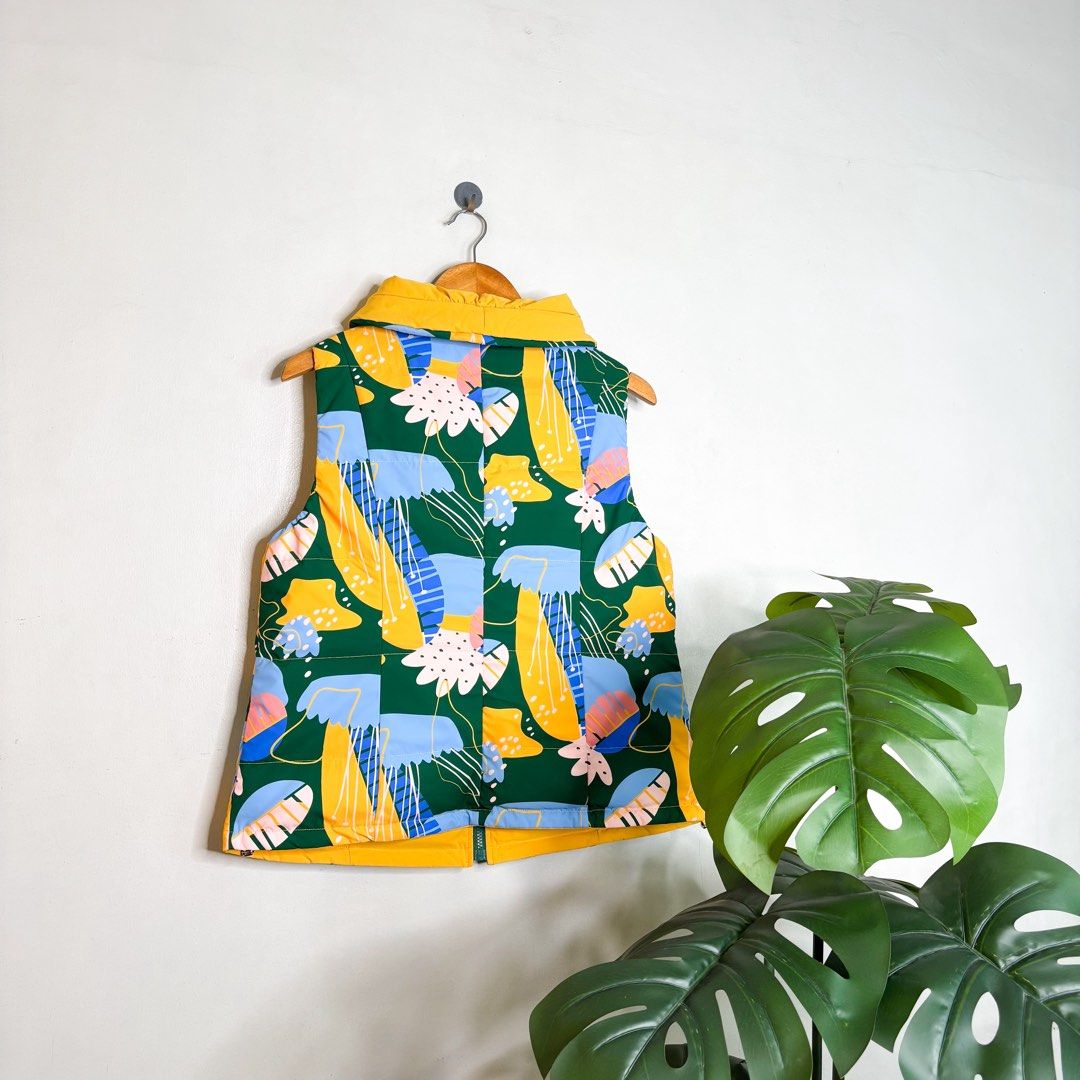 Gitti | Reversible Vest. (Category: Vests) located in Manila. Submitted by bypiecesandstories (Listing ID 1468323419, Image 3). Description: Gitti | Reversible Vest. 649 PHP 🧡 Perfect Condition Can Fit — X Small to Medium Dimensions — W 21" L 24.5" Two looks in one! This reversible vest features a bright yellow side and a colorful printed side, giving you two different styles in a single piece. Get two looks for the price of one, steal deal. • R