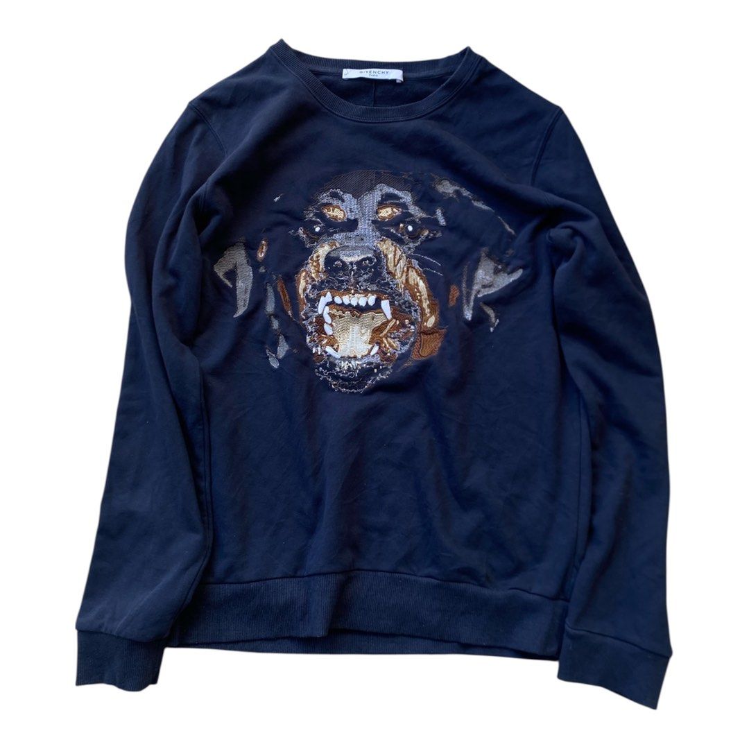 Givenchy Rottweiler Print Black Crewneck Sweatshirt (Category: Coats, Jackets and Outerwear) located in Bacolod City. Submitted by unkemptrags (Listing ID 1468439251, Image 1). Description: - Brand: Givenchy - Style: Iconic roaring Rottweiler graphic crewneck sweatshirt - Color: Classic Black - Fit: Regular fit, long sleeves - Details: Ribbed collar, cuffs, and hem - Condition: Great pre-loved condition, clean fabric with minimal wear - Perfect s