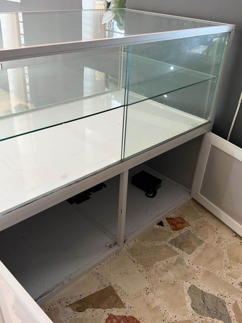 Glass Stante (Category: Storage Boxes & Baskets) located in Quezon City. Submitted by shop.bagamundo (Listing ID 1468320624, Image 3). Description: FS > FS > FS> FS> RUSH ❗️❗️❗️FOR SALE ‼️ Jewelry Glass Compartment 3 Levels Sliding door 2 Door bottom compartment Excellent condition ✅ Heavy Weight ✅ Thick glass ✅ Customizable ✅ Dent free ✅ Elegant/Front facing ✅ Business/ Personal compartment ✅ Showroom ready ✅ Best for storing Accessories/ Jewelr