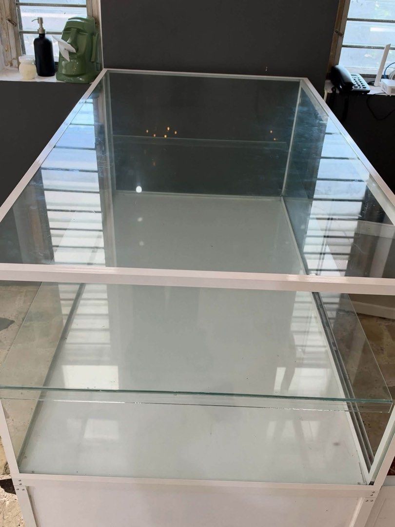 Glass Stante (Category: Storage Boxes & Baskets) located in Quezon City. Submitted by shop.bagamundo (Listing ID 1468320624, Image 2). Description: FS > FS > FS> FS> RUSH ❗️❗️❗️FOR SALE ‼️ Jewelry Glass Compartment 3 Levels Sliding door 2 Door bottom compartment Excellent condition ✅ Heavy Weight ✅ Thick glass ✅ Customizable ✅ Dent free ✅ Elegant/Front facing ✅ Business/ Personal compartment ✅ Showroom ready ✅ Best for storing Accessories/ Jewelr