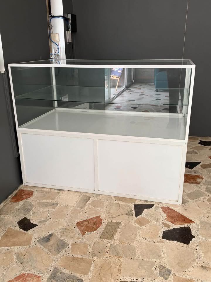 Glass Stante (Category: Storage Boxes & Baskets) located in Quezon City. Submitted by shop.bagamundo (Listing ID 1468320624, Image 1). Description: FS > FS > FS> FS> RUSH ❗️❗️❗️FOR SALE ‼️ Jewelry Glass Compartment 3 Levels Sliding door 2 Door bottom compartment Excellent condition ✅ Heavy Weight ✅ Thick glass ✅ Customizable ✅ Dent free ✅ Elegant/Front facing ✅ Business/ Personal compartment ✅ Showroom ready ✅ Best for storing Accessories/ Jewelr