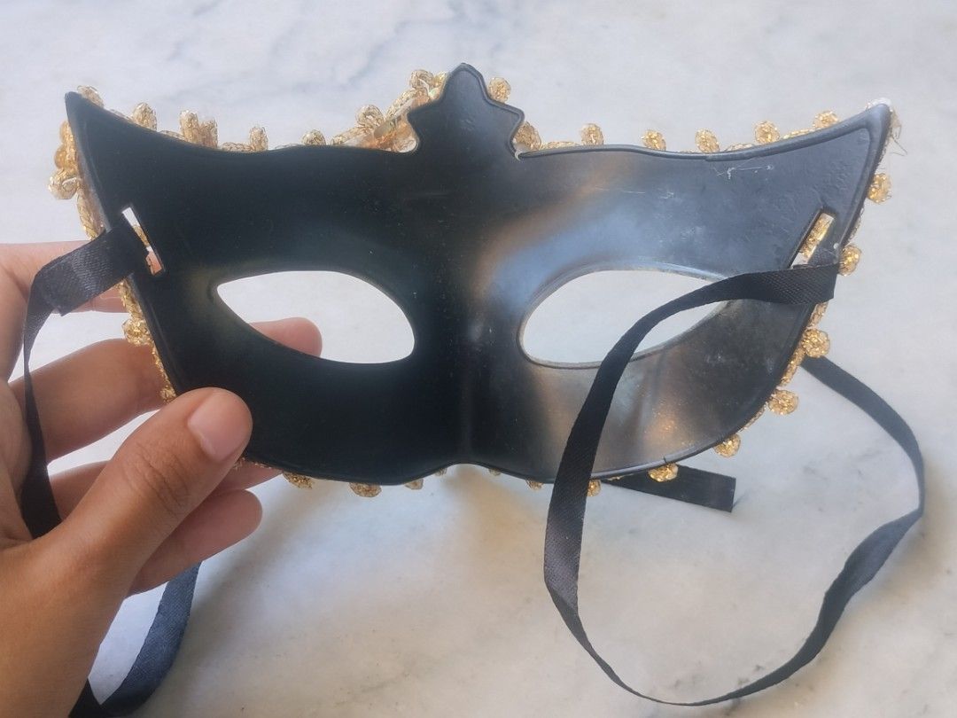 Gold Masquerade Mask with Sequins and Gem (Category: Occasions & Party Supplies) located in Las Pinas. Submitted by cozychic19 (Listing ID 1468381846, Image 3). Description: Gold masquerade mask with glitter, sequins, and a large center amber gem. Worn once, very clean, and comes with black satin ties..