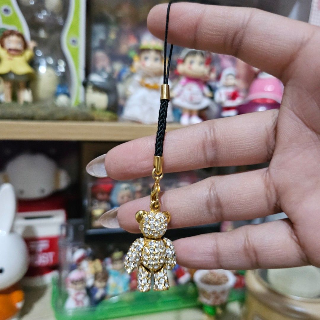 Gold Rhinestone Teddy Bear Charm Strap (Category: Charms) located in Manila. Submitted by lovelylovesjapan (Listing ID 1468368187, Image 3). Description: 🌸The item is on-hand and authentic from Japan 🌸Mode of Payment (MOP): GCASH/Bank Transfer 🌸Mode of Delivery (MOD): J&T or Lalamove (Shipping every Saturdays and Sundays) Notes: 🩷Breakable items are packed with care and caution. Seller will not be held liable for any damages incurred by the c