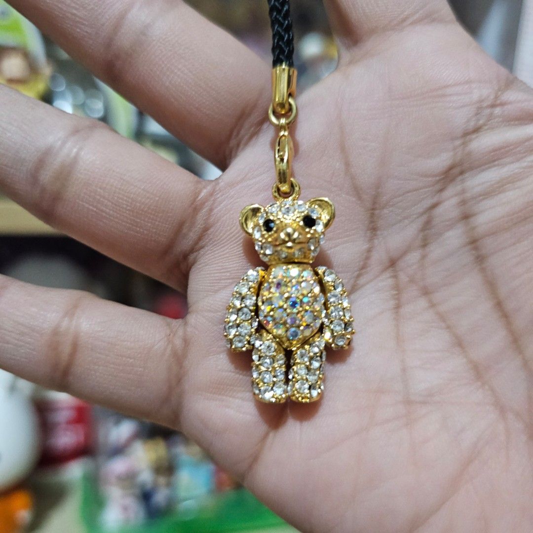 Gold Rhinestone Teddy Bear Charm Strap (Category: Charms) located in Manila. Submitted by lovelylovesjapan (Listing ID 1468368187, Image 2). Description: 🌸The item is on-hand and authentic from Japan 🌸Mode of Payment (MOP): GCASH/Bank Transfer 🌸Mode of Delivery (MOD): J&T or Lalamove (Shipping every Saturdays and Sundays) Notes: 🩷Breakable items are packed with care and caution. Seller will not be held liable for any damages incurred by the c