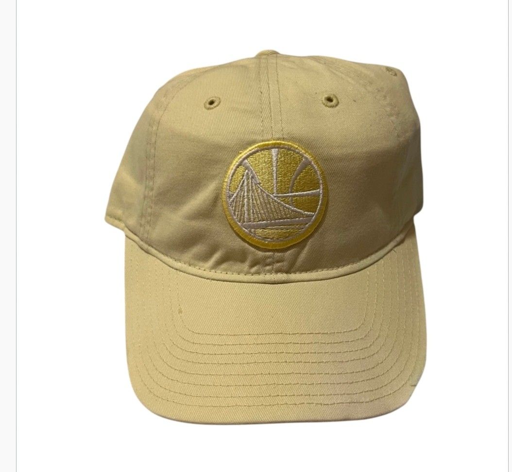 Golden State Warriors NBA Mitchell and Ness (Category: Caps & Hats) located in Cagayan de Oro. Submitted by lootfindzzzz (Listing ID 1468354745, Image 1). Description: - Tan baseball cap with embroidered Golden State Warriors logo - Curved brim with classic stitched eyelets - Adjustable strap closure for a customizable fit - Clean fabric, ready to wear - Great for game days or casual daily outfits.