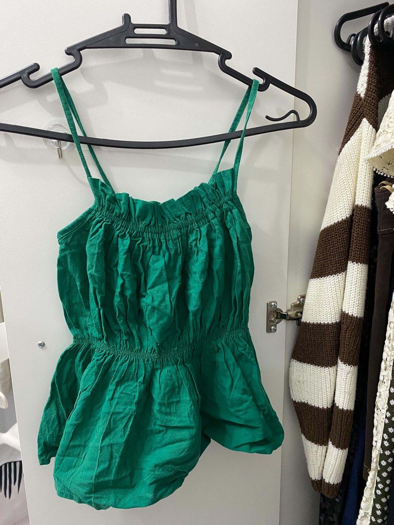 Green Linen Spaghetti Strap Peplum Top (Category: Sleeveless) located in Manila. Submitted by nienieniee (Listing ID 1468466657, Image 1). Description: - free size - so nice, it’s linen - used once lang sa school festival - light fabric, ideal for warm weather!! so presko - great to pair with jeans or shorts.