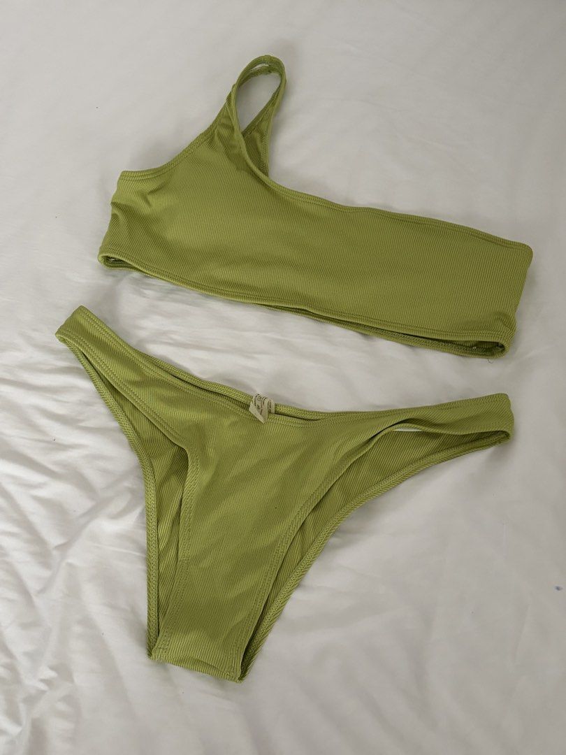 Olive Green One-Shoulder Ribbed Bikini Set - Size L (Category: Bikinis & Swimsuits) located in Las Pinas. Submitted by thriftedfinds_ (Listing ID 1468395063, Image 1). Description: - Condition: Worn once (washed already) - Color: Olive green - Material: Textured ribbed fabric (80% nylon, 20% spandex) - Size: L (Both pieces) - Top: Chic one-shoulder strap with removable padding - Bottoms: Cheeky fit with high-cut legs.