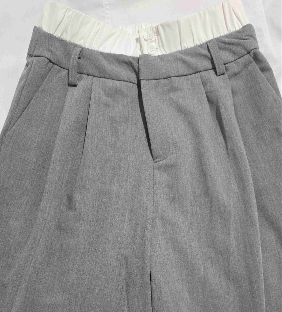 Grey Wide-Leg Pants (Category: Sets or Coordinates) located in Villasis. Submitted by juliaxgamboa (Listing ID 1468454461, Image 3). Description: - Pleated wide-leg pants with a mid-rise waistband, belt loops, and front pockets - Lightweight, comfortable fabric with clean tailoring - Solid grey color, easy to dress up or down - Perfect for smart-casual wear, office outings, and weekend dinners.