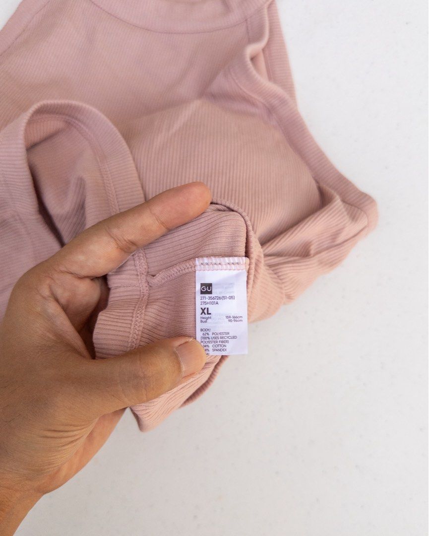 GU padded ribbed tank top (Category: Sleeveless) located in Makati City. Submitted by badethskie (Listing ID 1468392628, Image 3). Description: size XL NO issue/flaw .