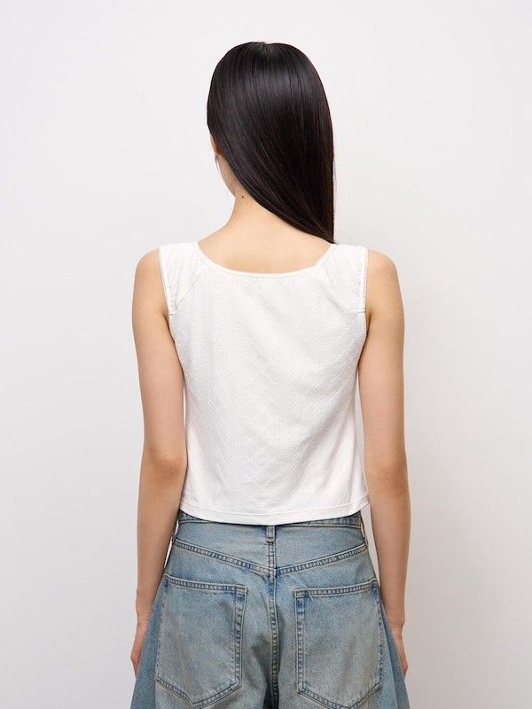 GU White Bra Tank Top Size M (Category: Sleeveless) located in Quezon City. Submitted by curatedbymissgee (Listing ID 1468292379, Image 2). Description: - Brand: GU - Item: Bra tank top - Color: Off-white - Size: M (Brand new with original tag) - Features: Built-in cups (no bra needed), textured fabric, gathered front detail - Style: Comfortable, perfect for daily wear or layering.