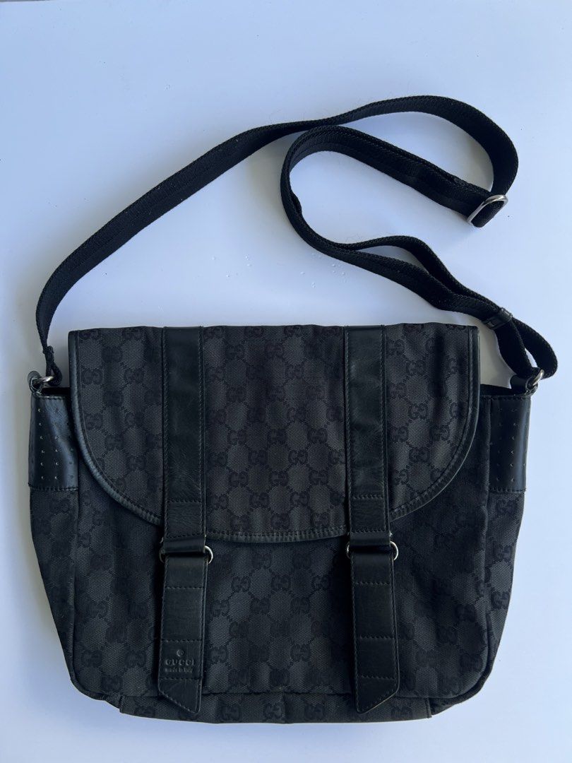 GUCCI - MONOGRAM BLACK GG MESSENGER BAG (Category: Luxury Bags & Wallets) located in Cavite. Submitted by _Gizmo (Listing ID 1468361715, Image 1). Description: Gucci - Monogram Black GG Messenger Bag Measurement Width: 14’ Inch Height: 11’ Inch Rank AB Normal sign of wear No rubs Made In Italy .