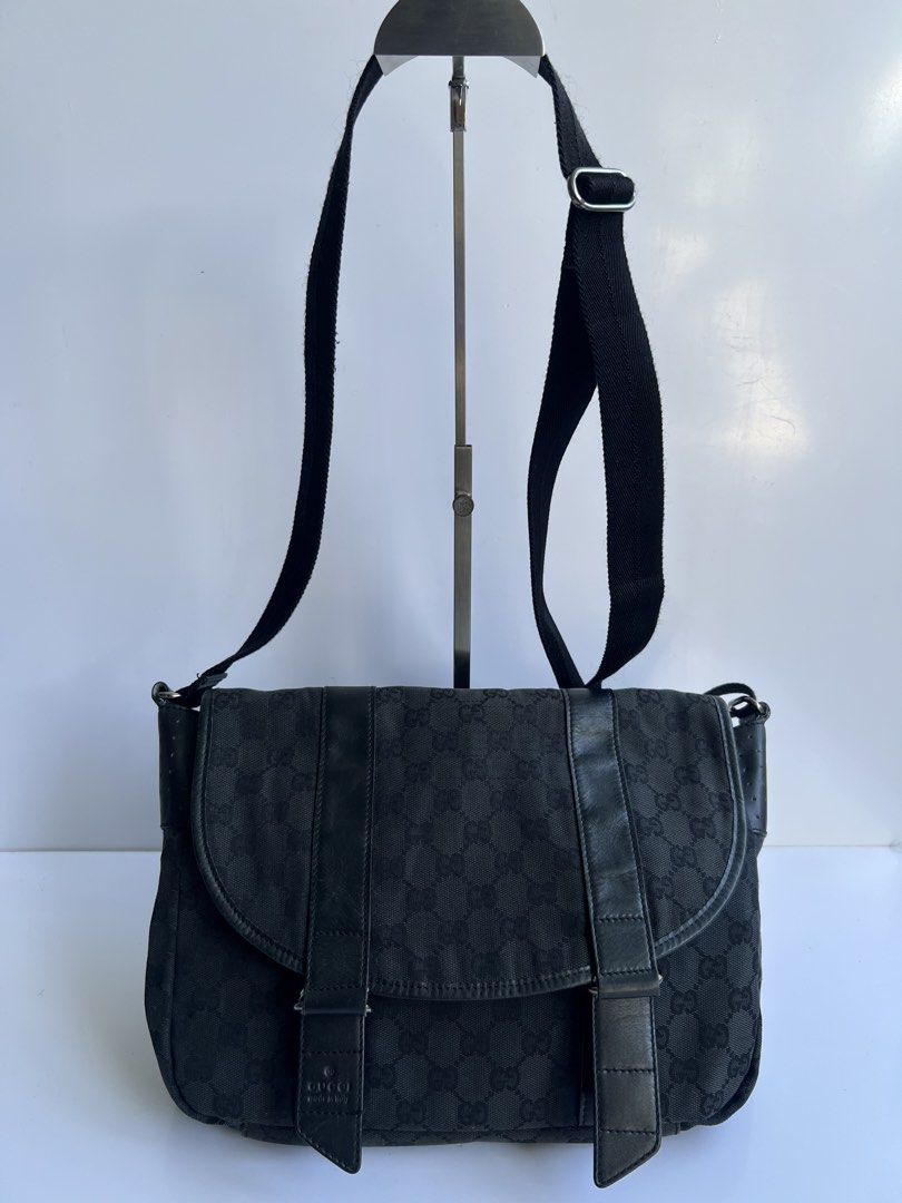 GUCCI - MONOGRAM BLACK GG MESSENGER BAG (Category: Luxury Bags & Wallets) located in Cavite. Submitted by _Gizmo (Listing ID 1468361715, Image 2). Description: Gucci - Monogram Black GG Messenger Bag Measurement Width: 14’ Inch Height: 11’ Inch Rank AB Normal sign of wear No rubs Made In Italy .