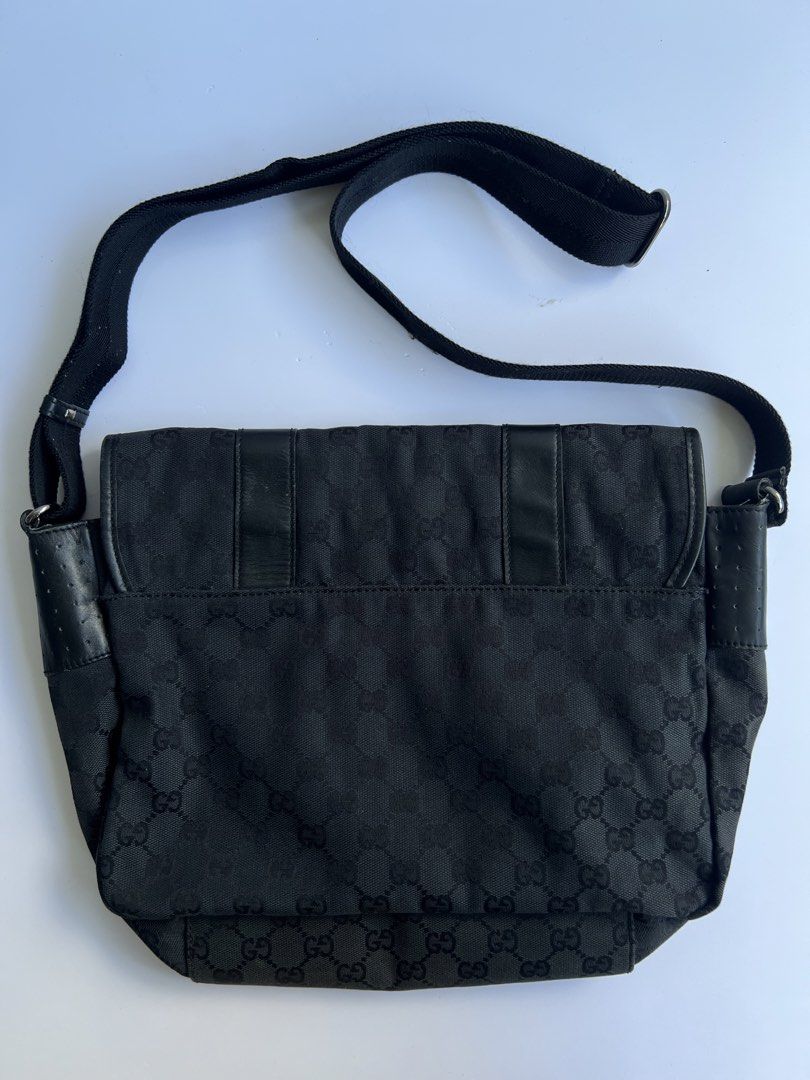 GUCCI - MONOGRAM BLACK GG MESSENGER BAG (Category: Luxury Bags & Wallets) located in Cavite. Submitted by _Gizmo (Listing ID 1468361715, Image 3). Description: Gucci - Monogram Black GG Messenger Bag Measurement Width: 14’ Inch Height: 11’ Inch Rank AB Normal sign of wear No rubs Made In Italy .