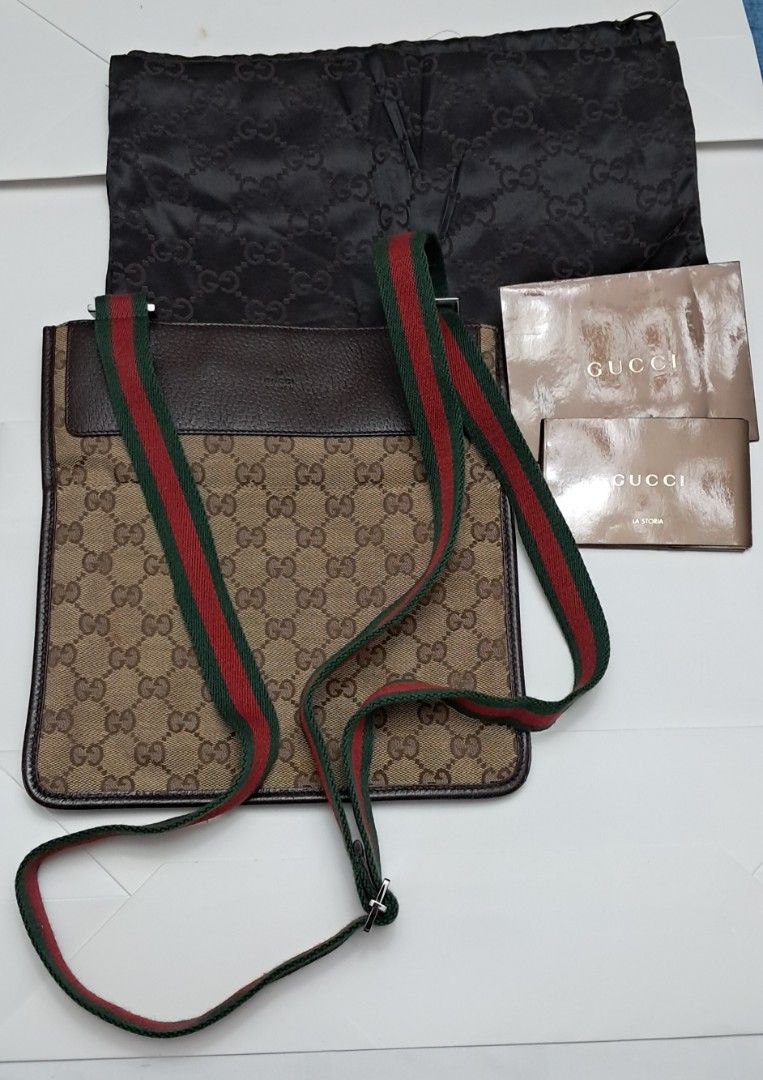 Gucci GG Canvas Web Messenger Bag with Dust Bag (Category: Luxury Bags & Wallets) located in Manila. Submitted by myrabundoc63934 (Listing ID 1468359145, Image 1). Description: - Authentic Gucci messenger bag in classic GG monogram canvas - Brown leather trim with iconic green and red web strap - Silver-tone hardware and clean brown fabric interior with zip pocket - Condition: Clean overall, with solid leather edges and strap - Inclusions: Origin