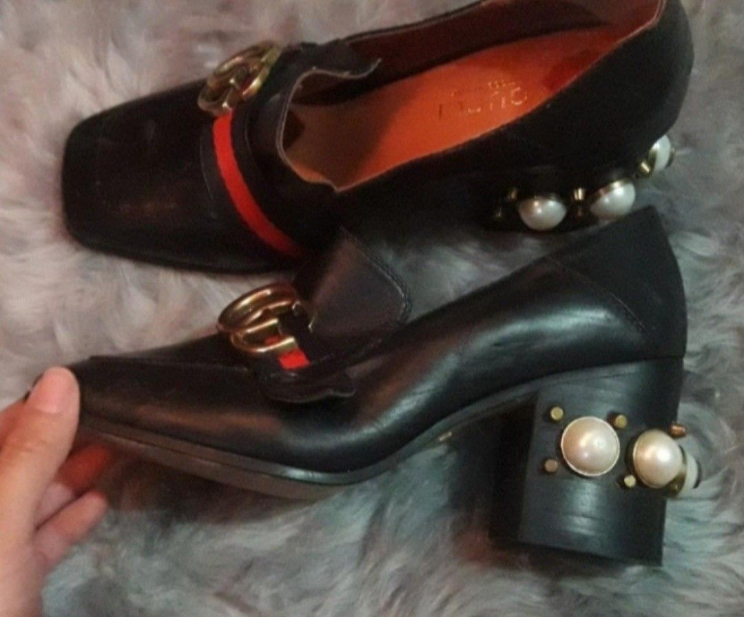 Gucci Loafer Mules (Category: Loafers) located in Batangas. Submitted by thriftshop_izy15 (Listing ID 1468336723, Image 2). Description: - Brand: Gucci - Style: Black leather loafers with square toe - Details: Signature red and green web stripe with interlocking GG hardware - Heels: Chunky block heels decorated with pearls and studs - Condition: Soles show unused - Perfect statement shoes for any chic outfit - Size:35/ 22cm.