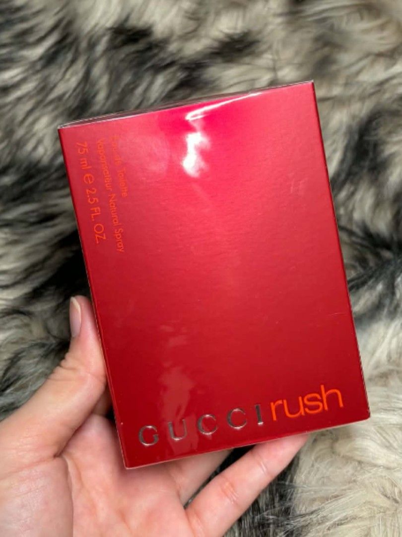 Gucci Rush Edt 75ml (Category: Fragrance & Deodorants) located in Manila. Submitted by the_realmgrace (Listing ID 1468477783, Image 1). Description: - Authentic Gucci Rush Eau de Toilette - Original from the 🇺🇸 - Generous 75 ml / 2.5 fl. oz. size with vaporisateur natural spray - Iconic red cassette-style box with bold orange lettering - Brand new, still wrapped in its original clear plastic packaging - A timeless, classic retro fragrance that 