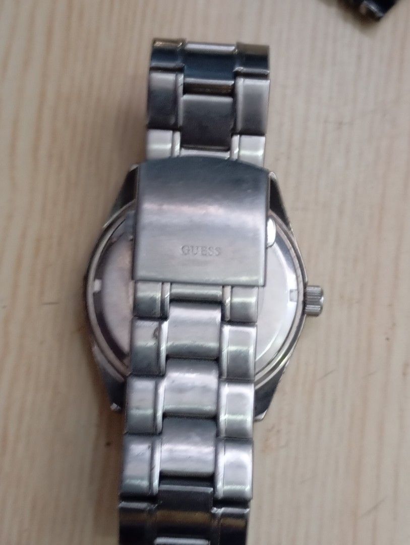 Guess (Category: Men's Watches) located in Las Pinas. Submitted by quick_deals_great_finds2 (Listing ID 1468339112, Image 3). Description: Original good working condition Quartz with battery 42mm large fits wrist 6.8 inches.