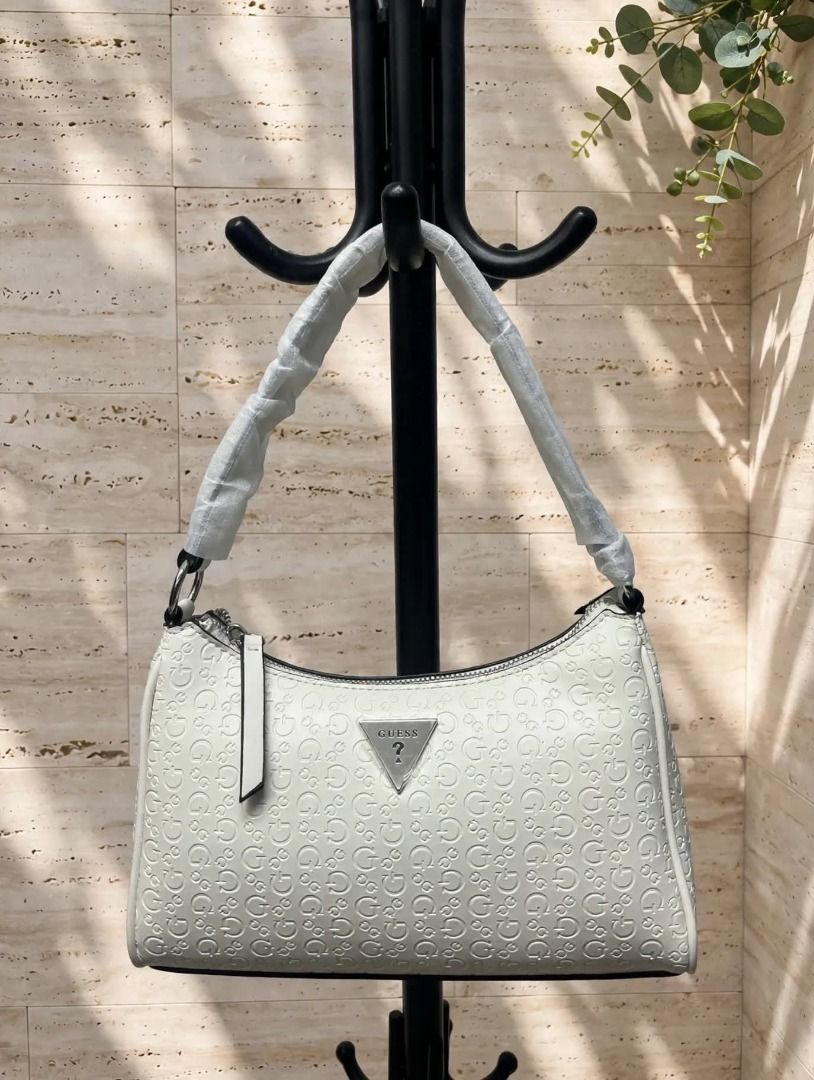 Guess Shoulder Bag - White (Category: Shoulder Bags) located in Rizal. Submitted by hiraya16 (Listing ID 1468304050, Image 1). Description: Onhand ready to ship DM for inquiries. ✉️.
