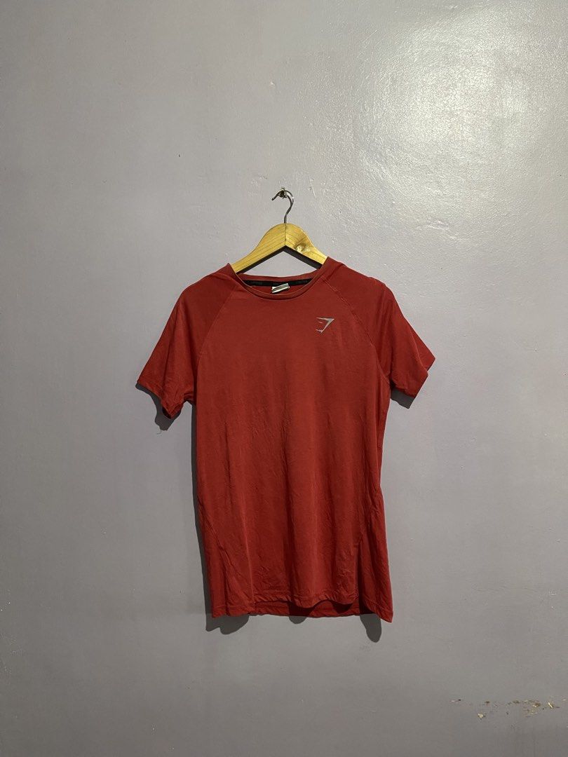 Gymshark Compression Shirt (Category: Tshirts & Polo Shirts ) located in Angeles City. Submitted by andreiboughts (Listing ID 1468414944, Image 1). Description: Length: 28 Width: 17 Condition: 9/10 Color rate: 9/10 Issue (s): Stretched Neckline / Bacon Complete Tags ✅ Medium on tag Made in Bangladesh.
