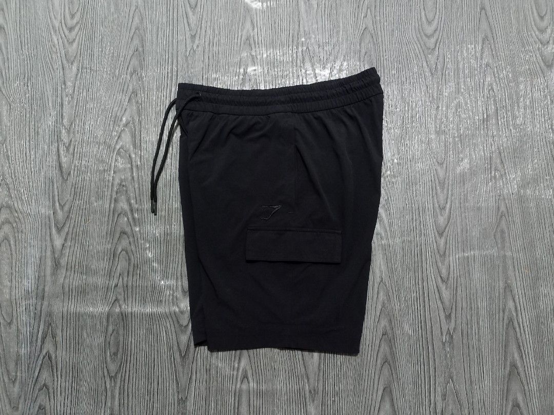 Gymshark Short (Category: Activewear) located in Danao, Cebu. Submitted by 6000thrifts.ph (Listing ID 1468315855, Image 3). Description: Gymshark Stretch Woven Cargo Short 📥 Size Small Waistline 30-34 (Strechable) Length 19 / Embroidery Logo Good Excellent Condition No issue/ Color rate 9.5/10 Pm for the price 📥.