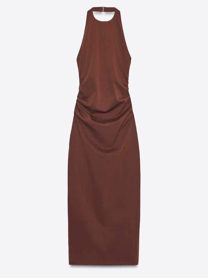 Halter Neck Ruched Midi Dress (Category: Dresses) located in Valenzuela. Submitted by luckyfalcon_011a05 (Listing ID 1468479437, Image 1). Description: - Style: Halter neck midi dress with a backless cut and adjustable tie string - Details: Flattering ruching down both sides - Closure: Back button closure - Material: Soft and stretchy fabric for all-day comfort - Colors Available: Maroon, yellow, and blue - Condition: Brand new.