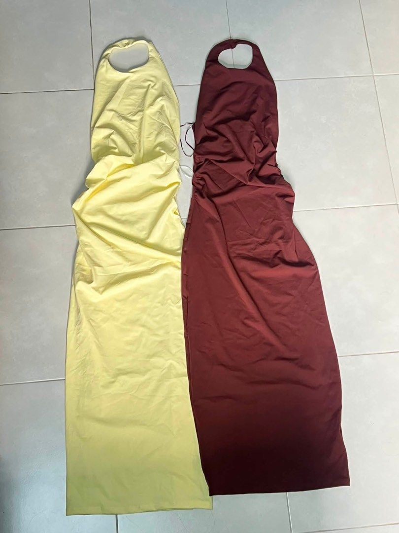 Halter Neck Ruched Midi Dress (Category: Dresses) located in Valenzuela. Submitted by luckyfalcon_011a05 (Listing ID 1468479437, Image 3). Description: - Style: Halter neck midi dress with a backless cut and adjustable tie string - Details: Flattering ruching down both sides - Closure: Back button closure - Material: Soft and stretchy fabric for all-day comfort - Colors Available: Maroon, yellow, and blue - Condition: Brand new.