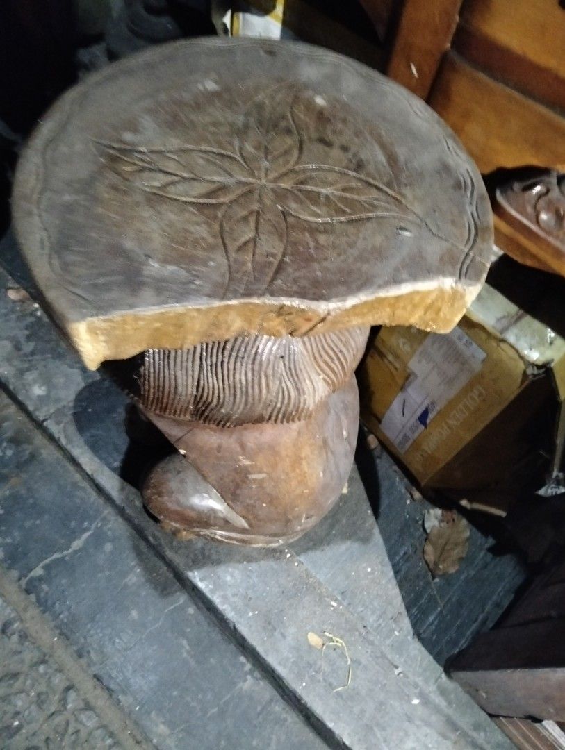 Hand carved wooden lion stool with floral top (Category: Chairs) located in Manila. Submitted by raymundm36884 (Listing ID 1468347313, Image 2). Description: - Handcrafted solid wooden stool with a unique lion shape - Detailed mane and facial carvings on the base - Beautiful carved flower petal pattern on the seat - Heavy and stable wood construction - Rich brown finish, perfect for statement home decor.