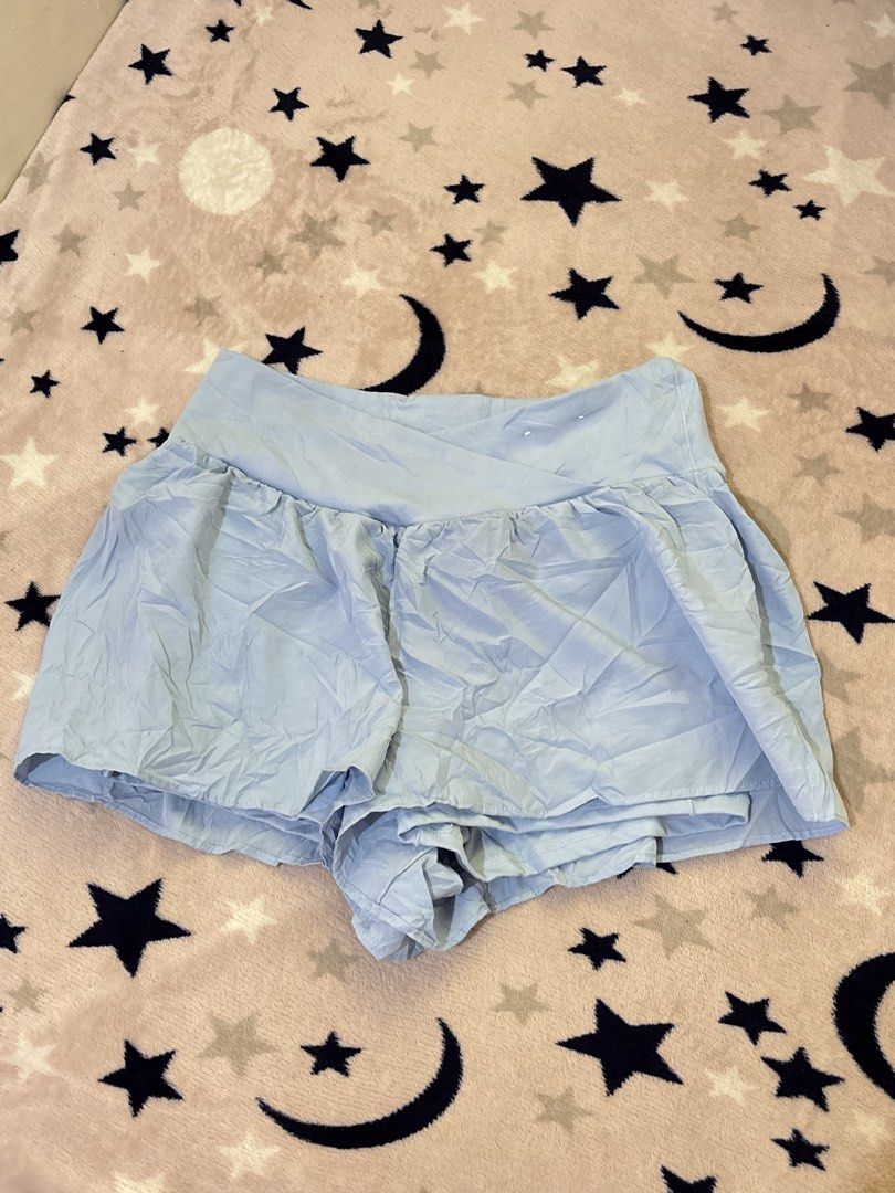 Happily Grey Light Blue Crossover Active Skort (Category: Activewear) located in Batangas. Submitted by lilirosie (Listing ID 1468345230, Image 1). Description: - Brand: Happily Grey - Color: Light blue - Design: High waist with a trendy crossover waistband - Comfort: Built-in inner shorts for extra coverage and confidence - Material: Soft and stretchy fabric - Versatility: Ideal for workouts, running errands, or casual daily wear.