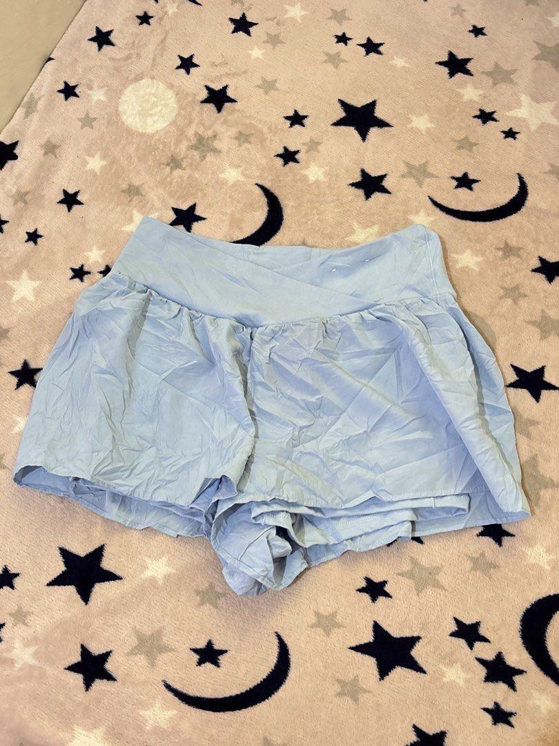 Happily Grey Light Blue Crossover Active Skort (Category: Activewear) located in Batangas. Submitted by lilirosie (Listing ID 1468345230, Image 2). Description: - Brand: Happily Grey - Color: Light blue - Design: High waist with a trendy crossover waistband - Comfort: Built-in inner shorts for extra coverage and confidence - Material: Soft and stretchy fabric - Versatility: Ideal for workouts, running errands, or casual daily wear.