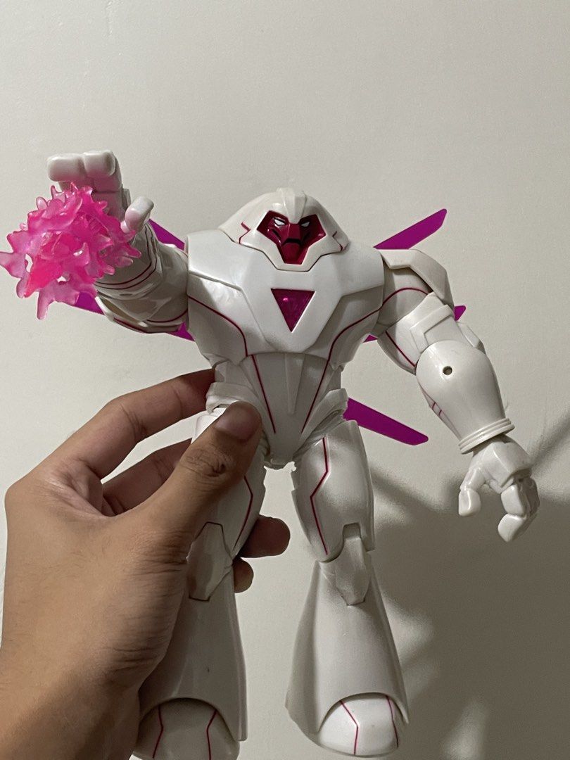 Hasbro Marvel Legends Nimrod (Category: Figurines & Statues) located in Manila. Submitted by cyruscedri44659 (Listing ID 1468477386, Image 2). Description: - Character: Marvel Legends Nimrod - Design: White armor with pink accents and magenta translucent energy effects - Accessories: Includes interchangeable hands and an alternate head - Condition: Solid and tight joints, excellent for display -Issue yellowing since old stock.