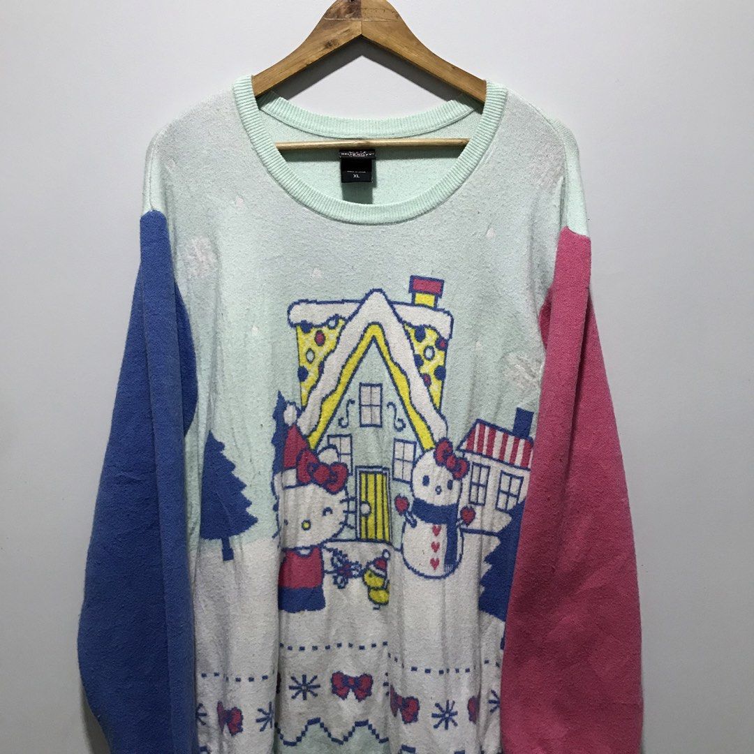 HELLO KITTY Official Christmas Knitted Sweatshirt (Category: Coats, Jackets and Outerwear) located in Cavite. Submitted by tanya.valentin (Listing ID 1468389737, Image 1). Description: - 25x24.