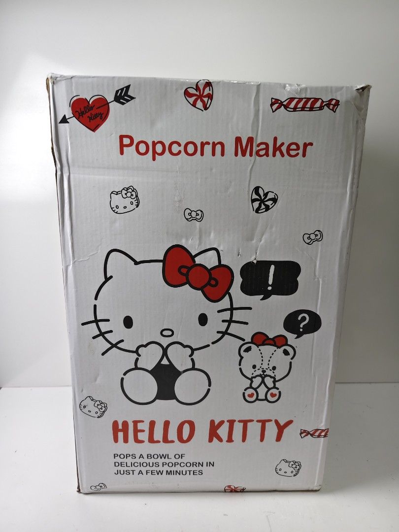 Hello Kitty Popcorn Maker Cart (Category: Food Organization & Storage) located in Las Pinas. Submitted by mommy_14 (Listing ID 1468378205, Image 1). Description: - Adorable Kitty vintage cart design with a red and white striped canopy - Fun and fast kitchen appliance for making fresh popcorn - Comes complete with the original packaging box - Perfect gift for Sanrio fans and kitchen collectors - Condition: Excellent, ready for display or use.