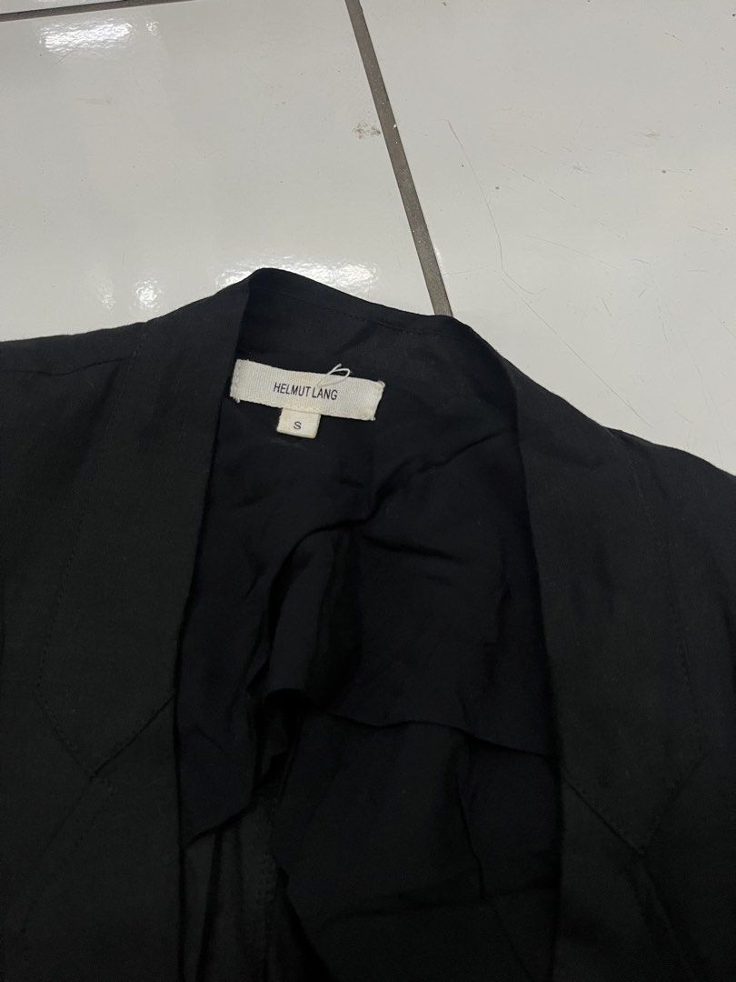 Helmut Lang Black Cotton Linen Blazer Size S (Category: Coats, Jackets and Outerwear) located in Manila. Submitted by shanaaa.collects (Listing ID 1468302851, Image 2). Description: - Brand: Helmut Lang - Color: Black - Size: Small (S) - Style Number: 909HW504 - Material: Lightweight cotton and linen blend - Design: Single-button closure, classic lapel, and long sleeves - Care: Dry clean only - Origin: Made in China - Condition: Excellent / Pre-l