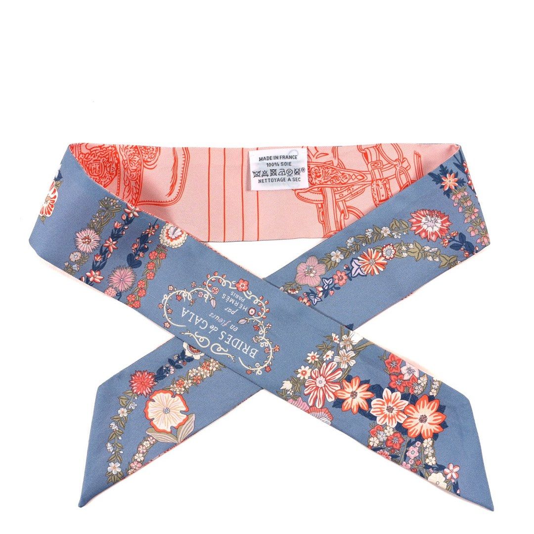 Hermes Brides de Gala en Fleurs Twilly Silk Scarf (Category: Scarves) located in Quezon City. Submitted by kellypochette (Listing ID 1468372471, Image 3). Description: 100% Authentic Beautiful Hermès Brides de Gala en Fleurs Twilly featuring the iconic equestrian motif with delicate floral details. A timeless and versatile accessory that adds a little Hermès charm to any outfit or handbag. ITEM DETAILS * Brand: Hermès * Design: Brides de Gala en 