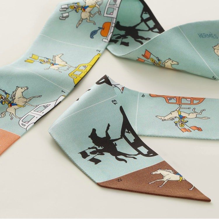 Hermès Parade Twilly silk scarf (Category: Scarves) located in Quezon City. Submitted by kellypochette (Listing ID 1468373963, Image 1). Description: Hermès Parade Twilly Silk Scarf | 100% Authentic A beautiful Hermès Parade Twilly featuring a playful, elegant design that captures the timeless charm and artistry of the French luxury house. Crafted from luxurious silk, this versatile accessory is perfect for dressing up your Birkin, Kelly, Picotin