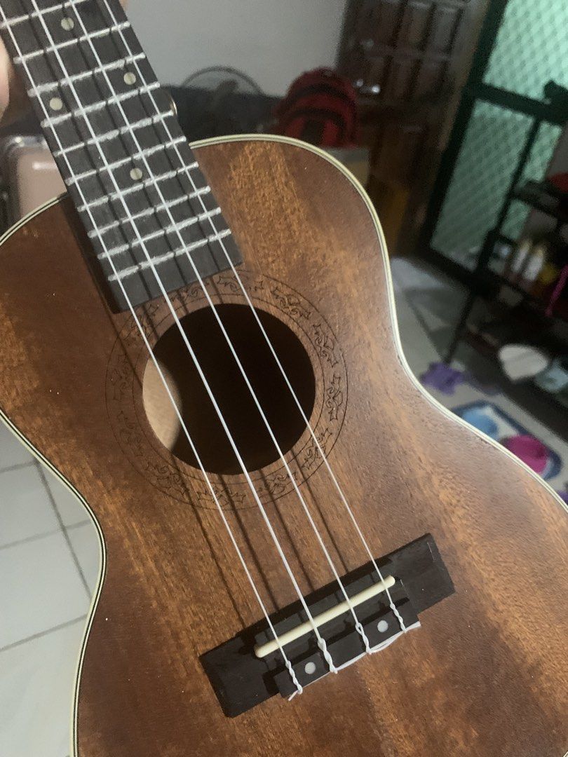 High Quality Ukulele (Category: Musical Instruments) located in Manila. Submitted by demigirl8117 (Listing ID 1468356441, Image 2). Description: This Ukulele is years old but still works really well. Barely used, ukulele strings are in good condition. ukulele cover is included..