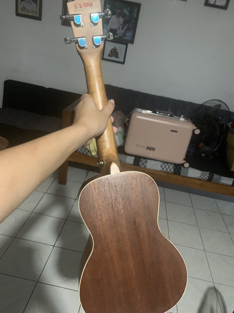 High Quality Ukulele (Category: Musical Instruments) located in Manila. Submitted by demigirl8117 (Listing ID 1468356441, Image 3). Description: This Ukulele is years old but still works really well. Barely used, ukulele strings are in good condition. ukulele cover is included..