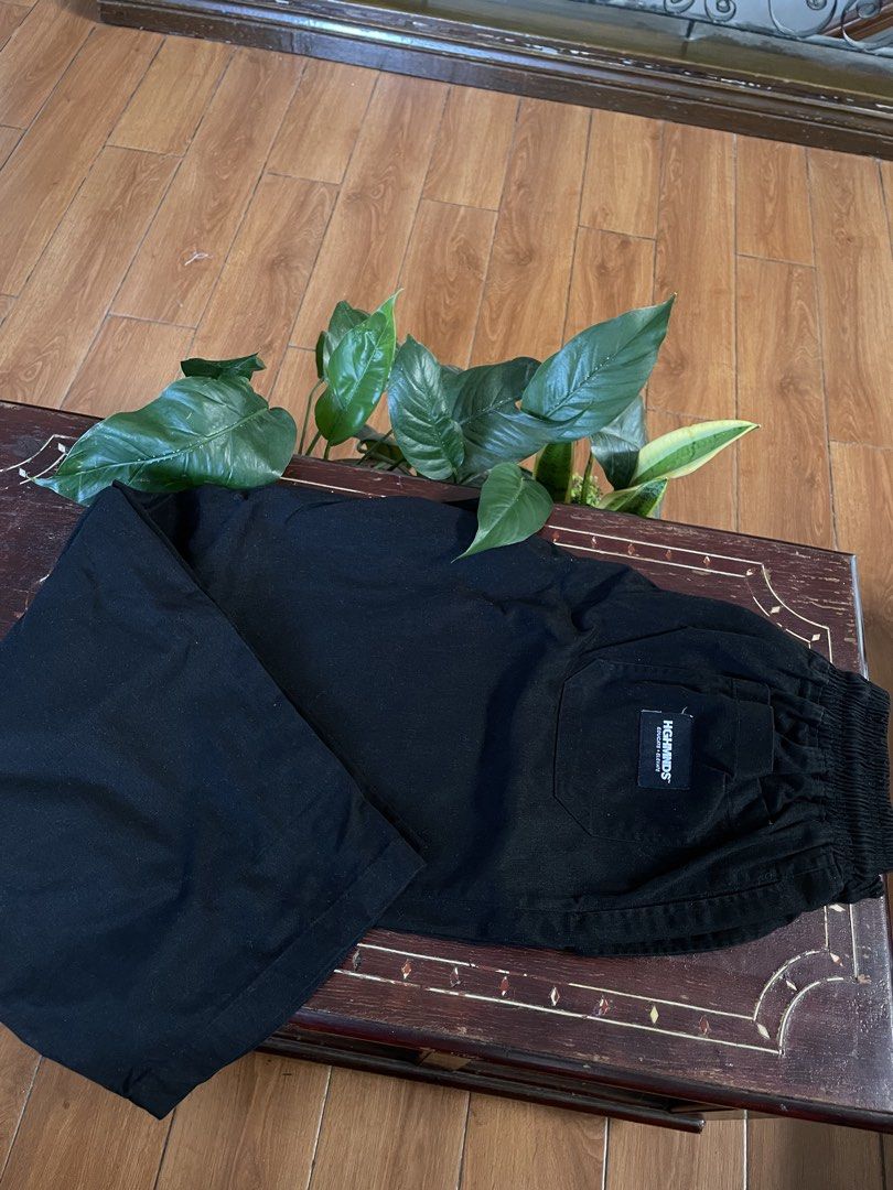 Highminds Black Pants with Drawstring and Pocket Label (Category: Joggers) located in Manila. Submitted by barrybalenshagga (Listing ID 1468354889, Image 1). Description: size 2XL (34-36) - Brand: Highminds - Color: Black - Fit: Relaxed fit for daily comfort - Waistband: Elastic with adjustable drawstring - Pockets: Includes back pocket with white Highminds brand tag - Details: Round embroidered logo near the hip and small patch label near the he