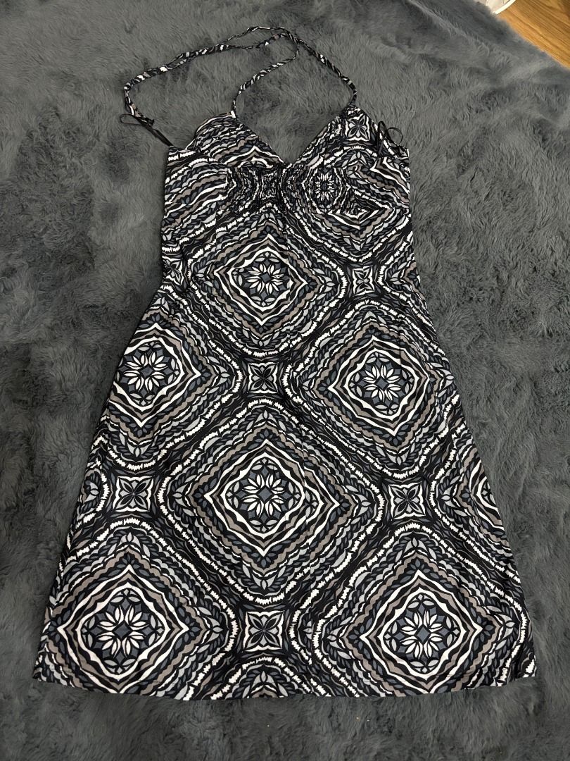 H&M Black and White Patterned Halter Neck Dress (Category: Dresses) located in Antipolo. Submitted by dddeclutter (Listing ID 1468360607, Image 2). Description: - Brand: H&M - Style: Halter neck dress with self-tie straps and flared skirt - Print/Color: Black, white, and grey geometric pattern - Fit: Stretchy smocked bodice panel - Size: US 8 / EUR 38 - Condition: Great piece for casual days or weekend lakwatsas!.