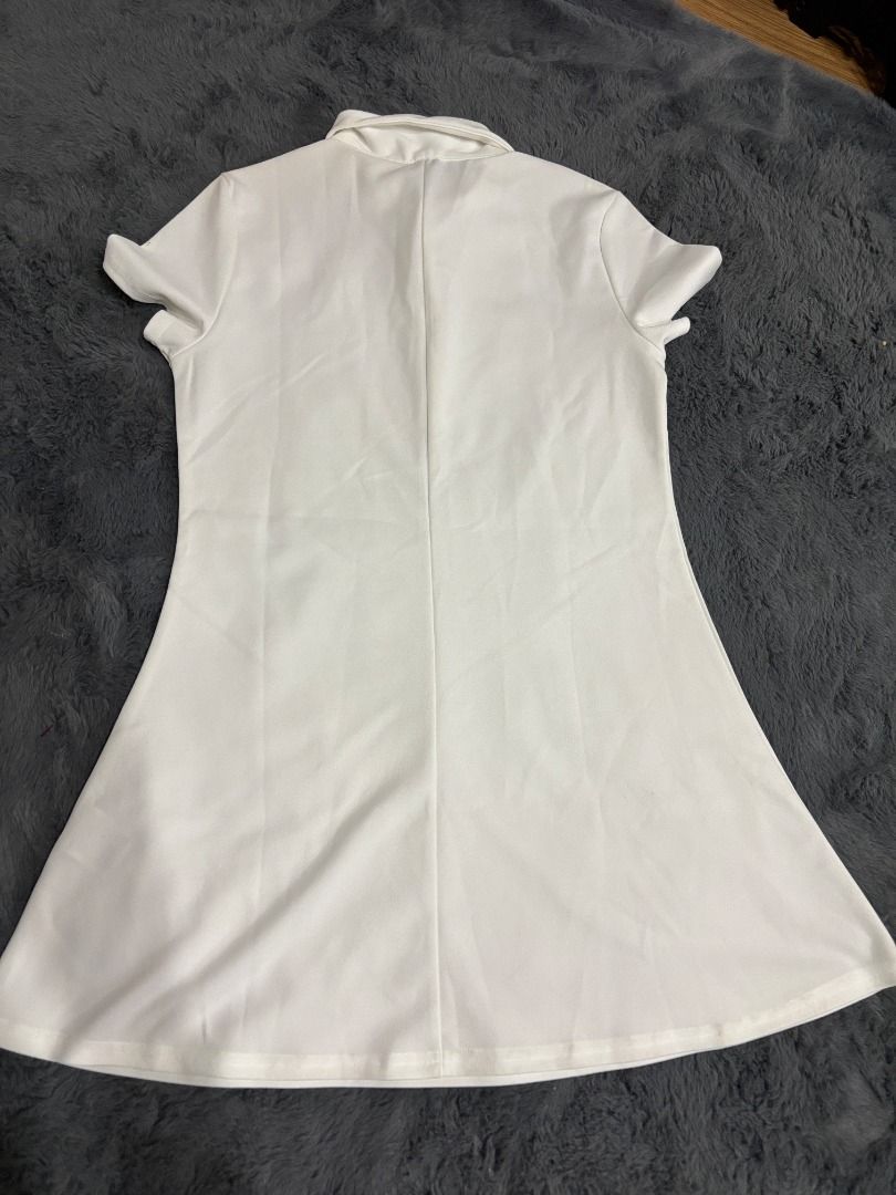 H&M Divided White Collared Short Sleeve Dress (Category: Dresses) located in Antipolo. Submitted by dddeclutter (Listing ID 1468348944, Image 2). Description: - Brand: H&M Divided - Color: White - Style: Collared short sleeve dress with zip-back closure - Size: EUR L / US L / 170/104B - Measurements: ~16" across waist, ~32" total length - Condition: Clean overall, with a few small faint marks near the bottom hem line but can be washed off.