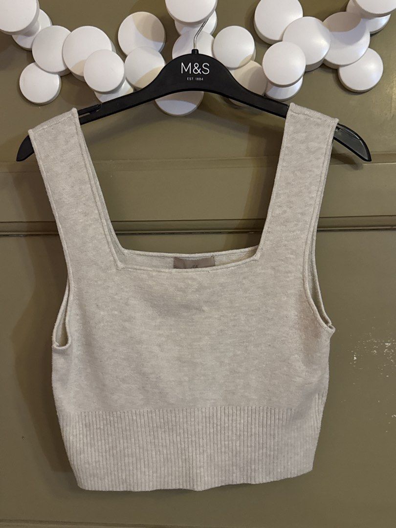 H&M Knit Top (Category: Sleeveless) located in Manila. Submitted by gabwie (Listing ID 1468406046, Image 2). Description: - Brand: H&M - Item: Sleeveless Knit Top - Color: Cream / Beige - Size: Medium (EUR M / US M) - Design: Square neckline with ribbed bottom hem - Condition: Excellent, well-maintained.
