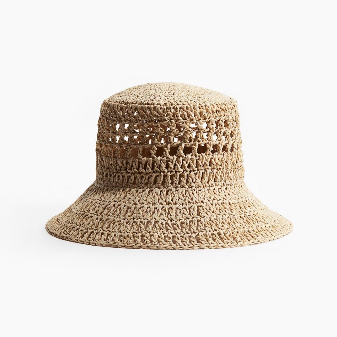 H&M Woven Straw Bucket Hat (Category: Hats & Beanies) located in Quezon City. Submitted by soloqueenph (Listing ID 1468407491, Image 2). Description: H&M Woven Straw Bucket Hat in neutral beige. Lightweight, breathable open-knit design with a wide brim. Perfect for beach trips and sunny days..
