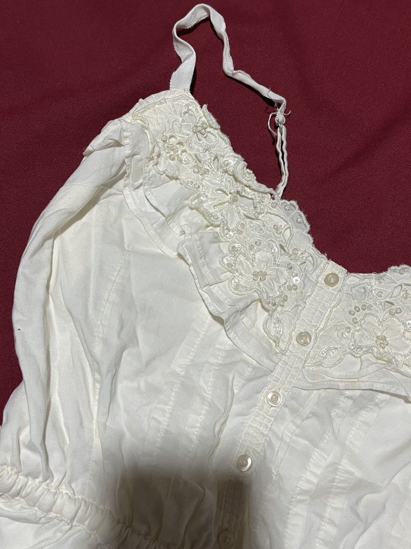 Vintage Hollister Co. Y2K beaded lace babydoll camisole top (Category: Sleeveless) located in Manila. Submitted by kathryn.frs (Listing ID 1468413624, Image 3). Description: - worn 3 times - long adjustable straps - iron a bit to not have creases size s-m.
