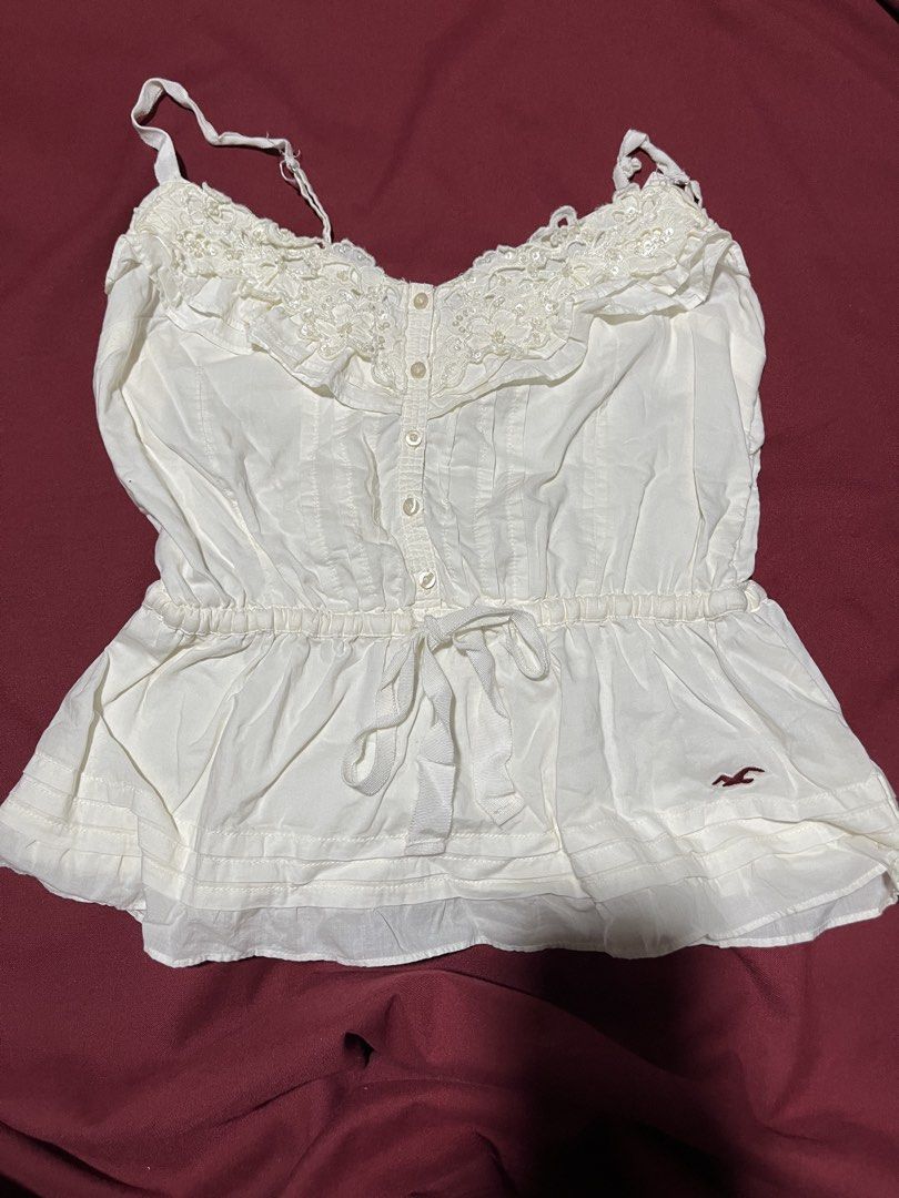 Vintage Hollister Co. Y2K beaded lace babydoll camisole top (Category: Sleeveless) located in Manila. Submitted by kathryn.frs (Listing ID 1468413624, Image 1). Description: - worn 3 times - long adjustable straps - iron a bit to not have creases size s-m.