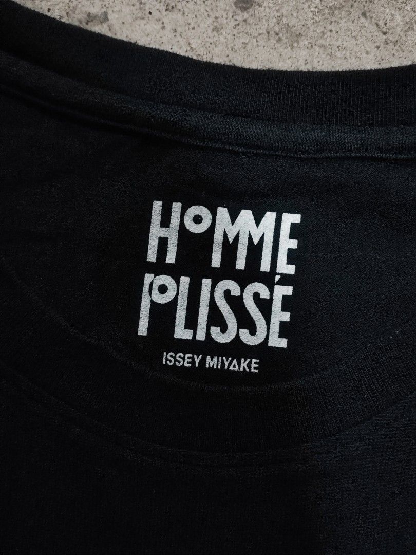 HOMME PLISSE ISSEY MIYAKE RELEASE TEE (Category: Tshirts & Polo Shirts ) located in Iloilo. Submitted by gooddimes (Listing ID 1468422548, Image 3). Description: Homme Plisse Issey Miyake Release Tee Authentic Plain Black color Size on tag: 2 Dimes: 23x28L Issue/s: No major flaws other than natural sign of usage Color rate: 9.5/10 Excellent condition ₱1,899 Reminders: - All items are thrifted, please manage your expectations - Color may vary due 